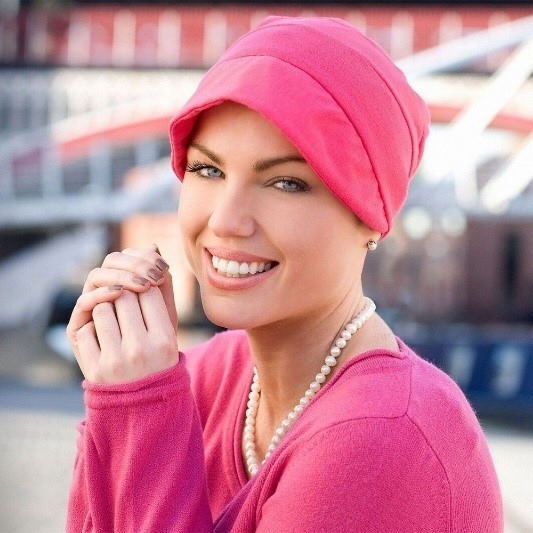 Woman Wearing A Vibrant Pink Hat