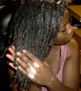 woman washing dreads