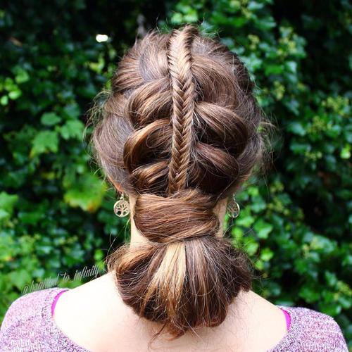 braided updo with a looped ponytail