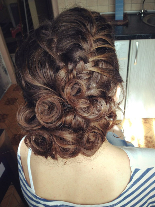 curly updo with a braid for medium hair