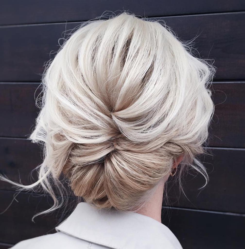 Messy Low Updo with a Braid
