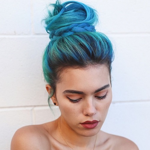 messy top knot hairstyle