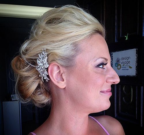 curly messy bridal updo for thin hair