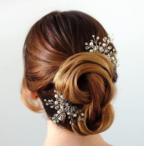 twisted bridal updo with beaded hair pieces