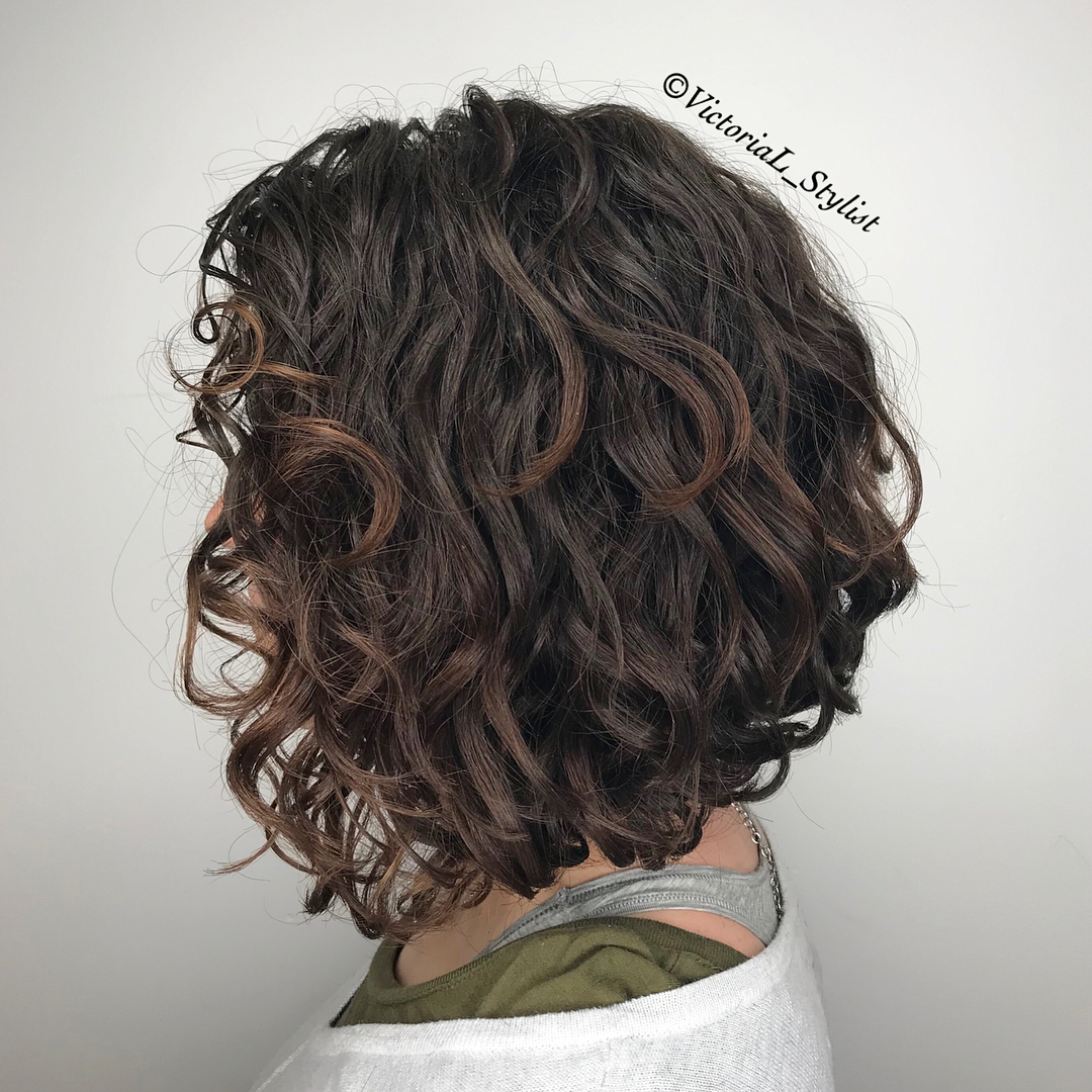 Angled Curly Black Bob With Chocolate Highlights