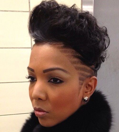black curly mohawk with side shaven designs