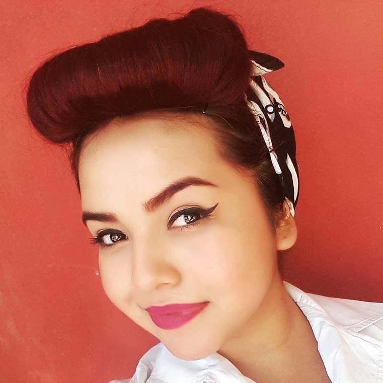brunette pin up hairstyle with a scarf