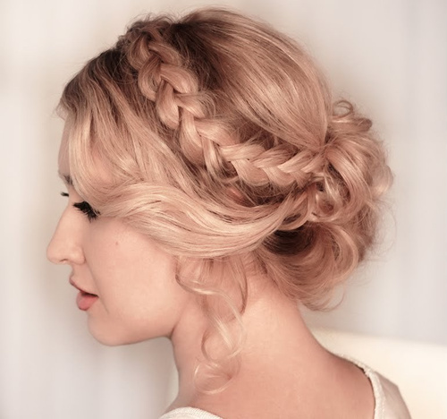 loose curly updo with a headband braid