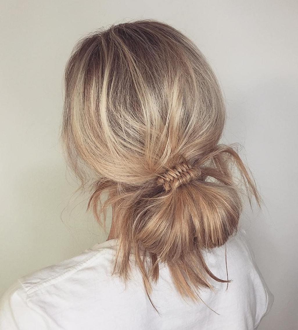 Low Knotted Bun And Fishtail Braid