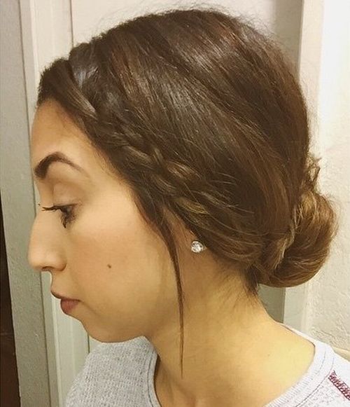 simple low bun with a side braid