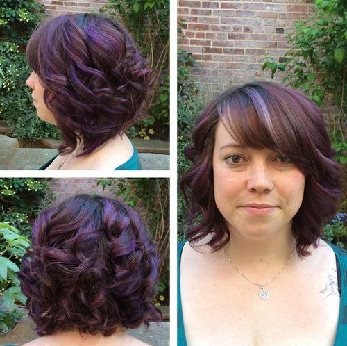 Dark brown hair with purple highlights and bangs