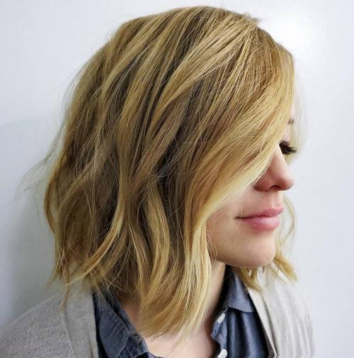 blonde side parted lob with loose waves