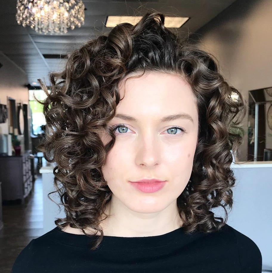 Shoulder-Length Layered Curly Hairstyle