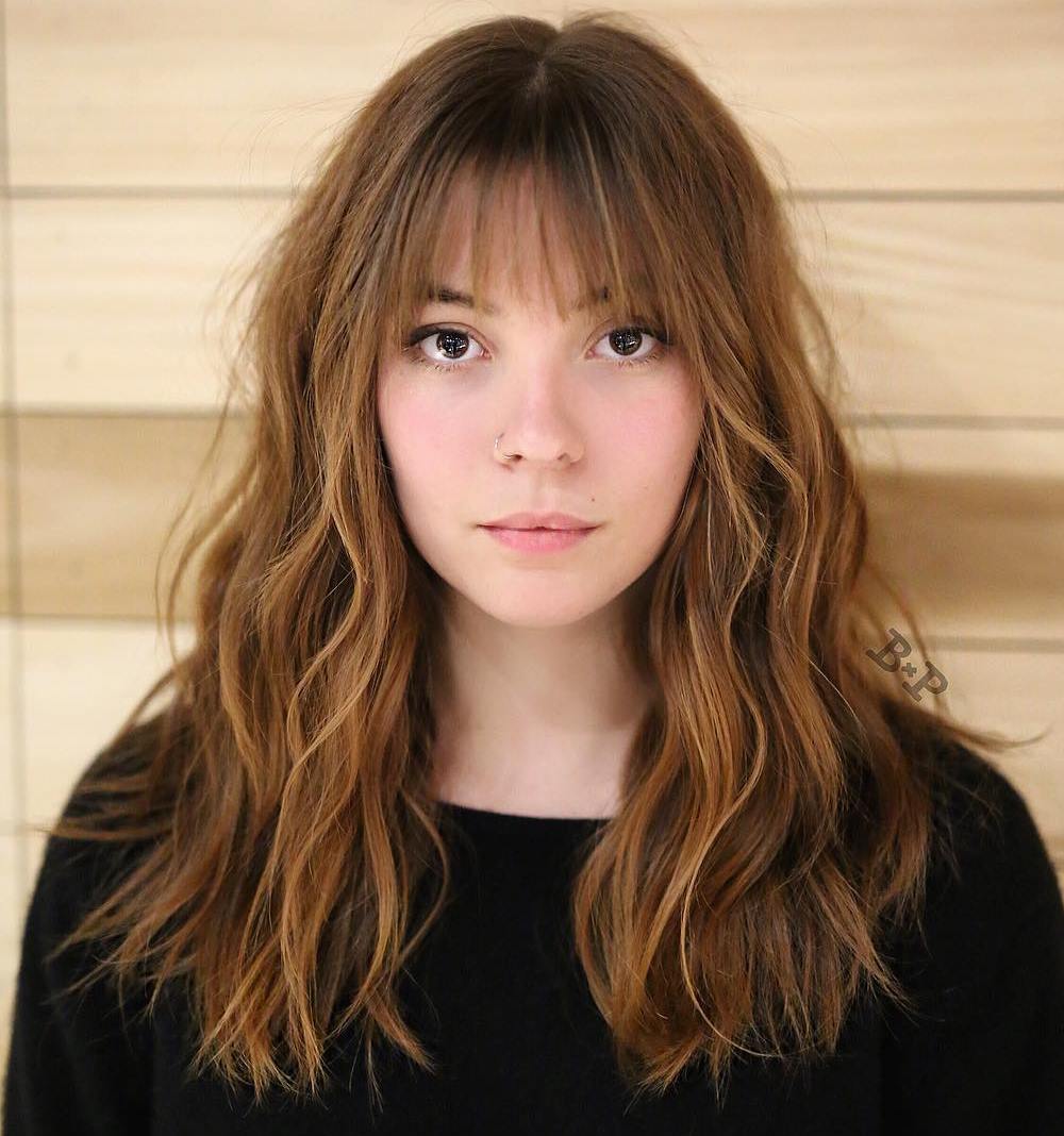 Long Wavy Hairstyle With Straight Bangs