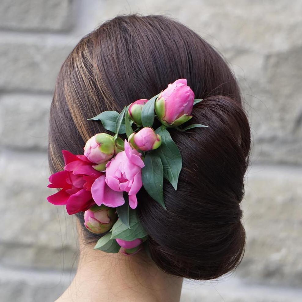 Sleek Side Chignon With Flowers