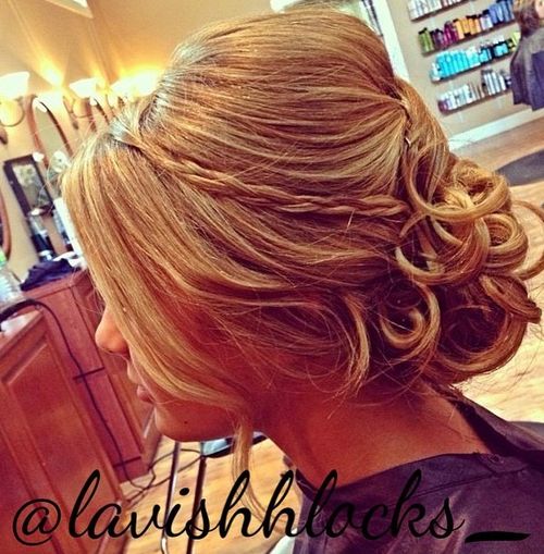 curly updo with a bouffant and braid
