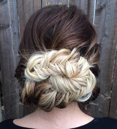 messy fishtail updo for long thick hair