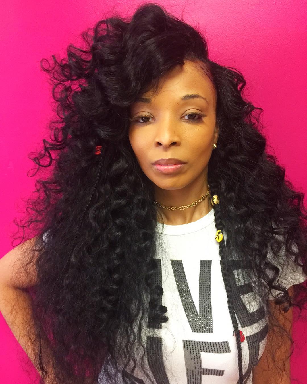 Long Layered Curly Sew-In Hairstyle