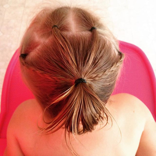little girls hairstyle with ponytails