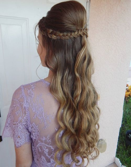 long half up half down hairstyle with a bouffant