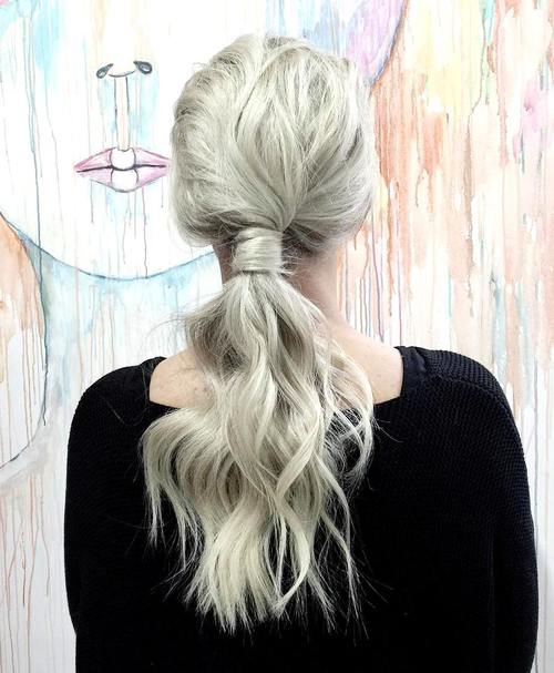 Long Low Blonde Tousled Ponytail