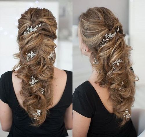 wedding curly downdo with hair flowers