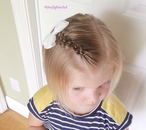 baby girls bob hairstyle with braided bang