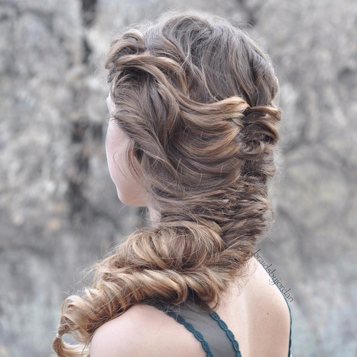 loose chunky fishtail braid hairstyle