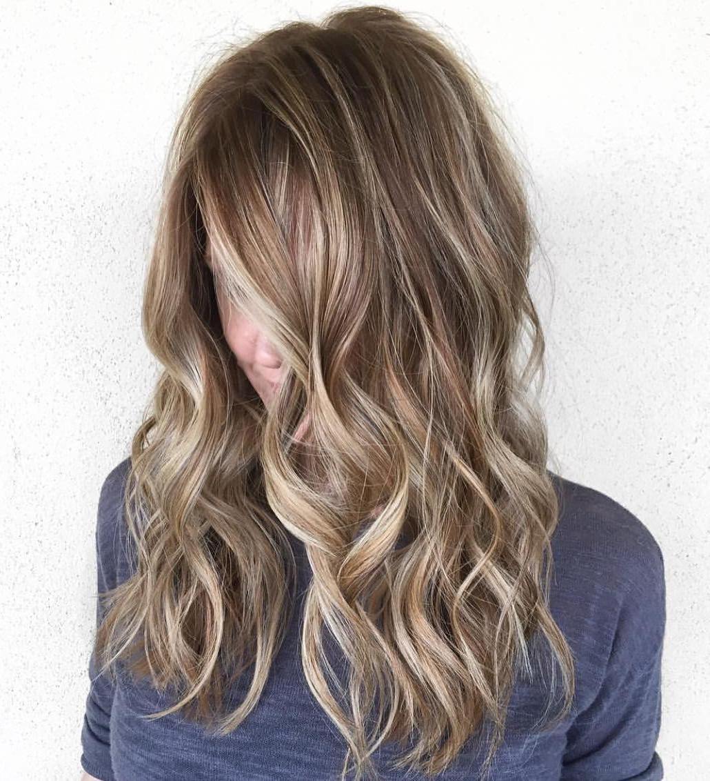 Wavy Brown Hair With Highlights