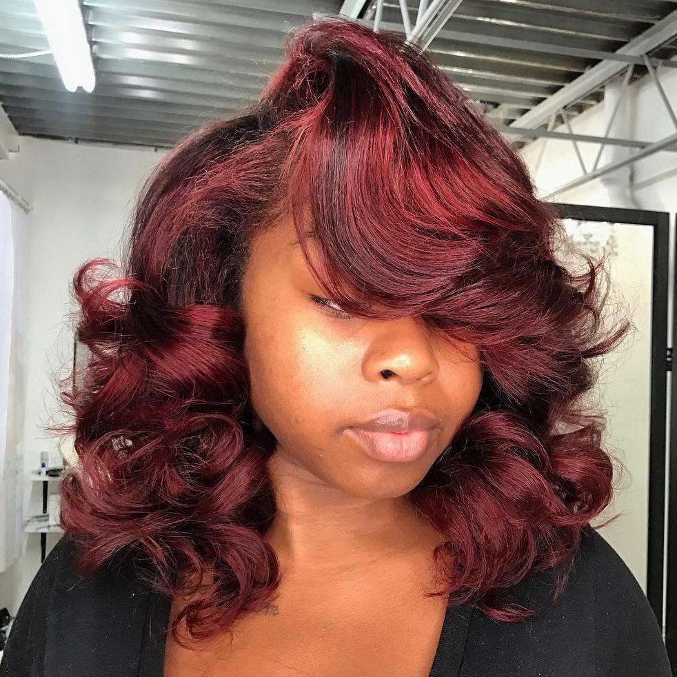 Medium Sew In Hairstyle With Bangs