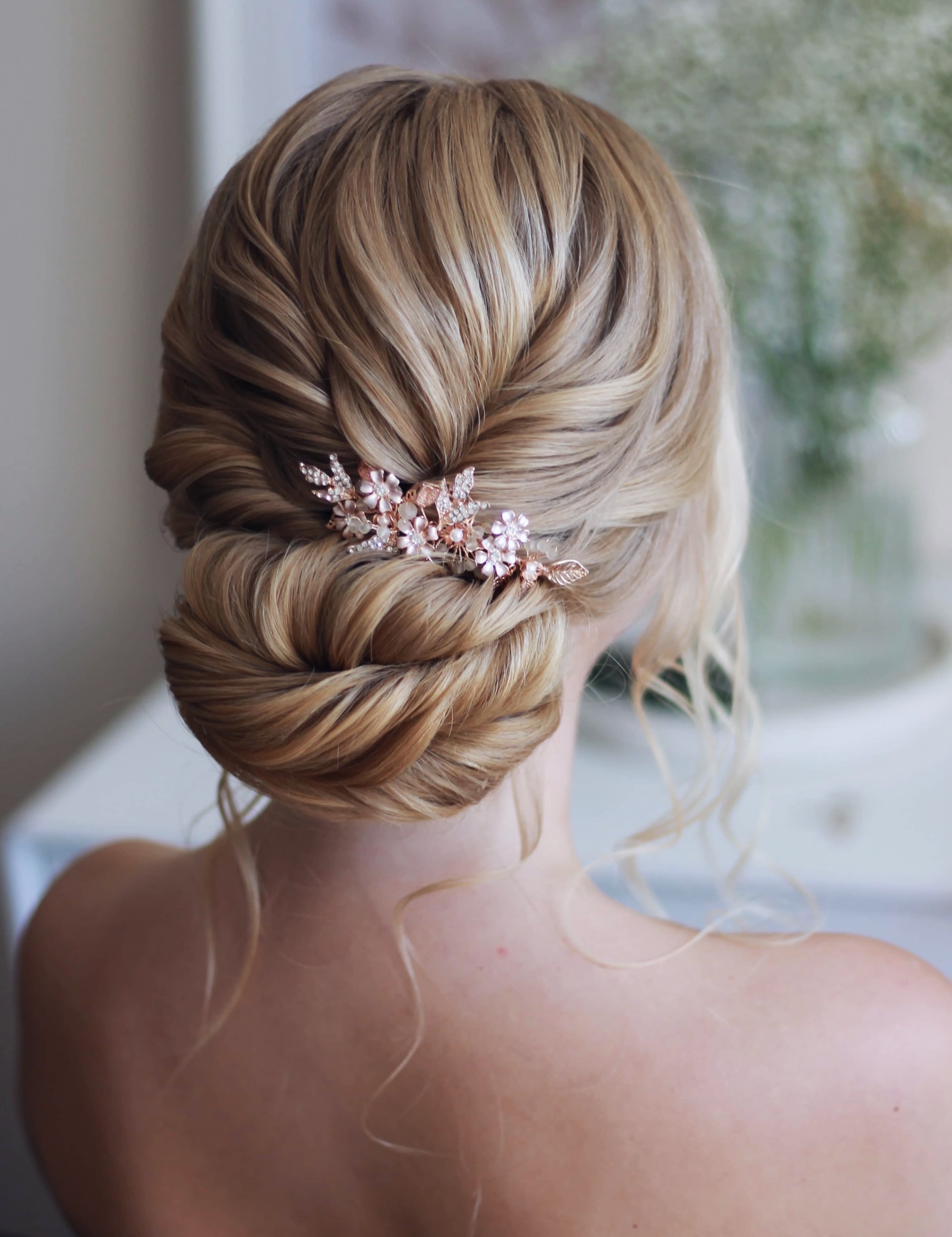 Blonde Bridal Low Bun with a Rose Gold Clip