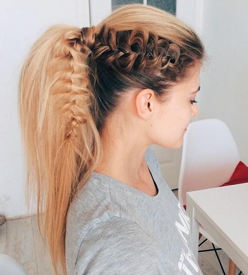high voluminous ponytail hairstyle with a braid