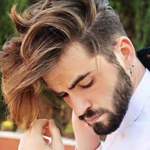 men's hairstyle with a long quiff