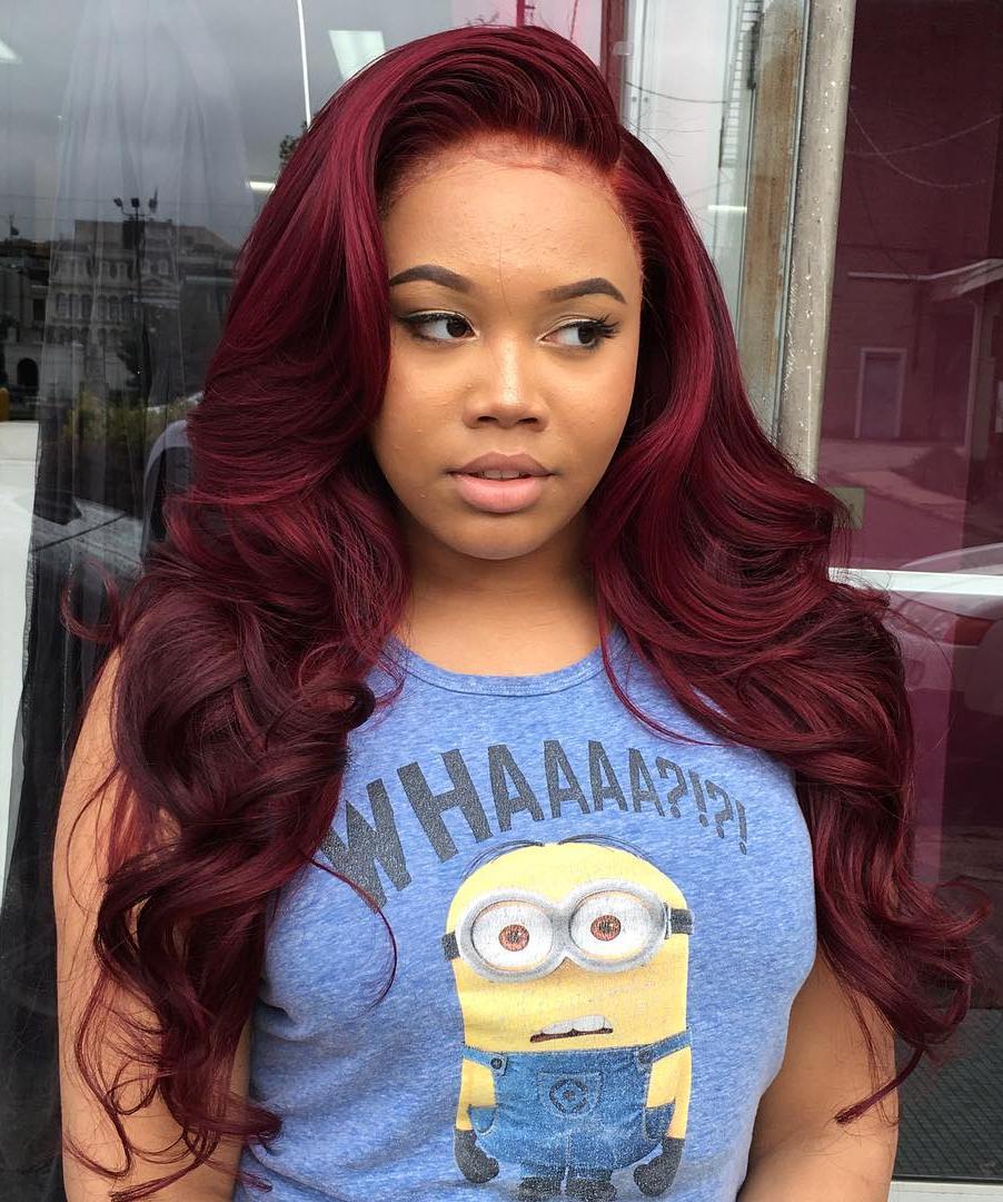 Long Curly Burgundy Sew In Hairstyle
