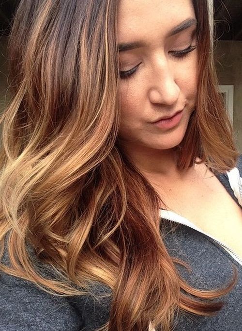 layered hairstyle with caramel highlights