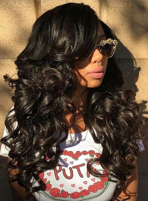 long curly sew-in hairstyle