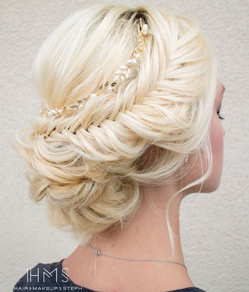 messy blonde updo with fishtail braid