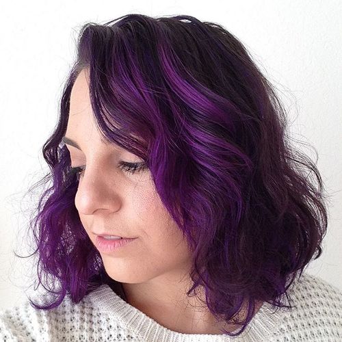 dark brown hair with bright purple highlights