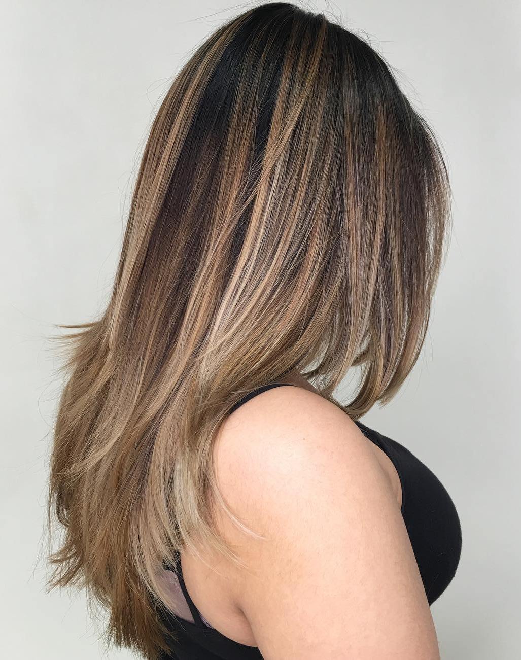 Straight Layered Hair With Cool-Toned Bronde Balayage