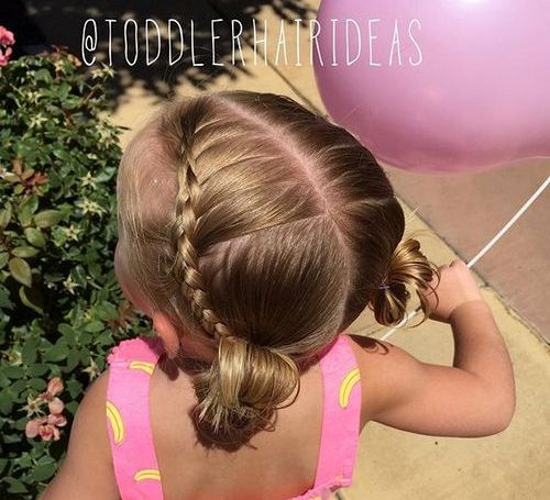 braided baby hairstyle with pigtail buns