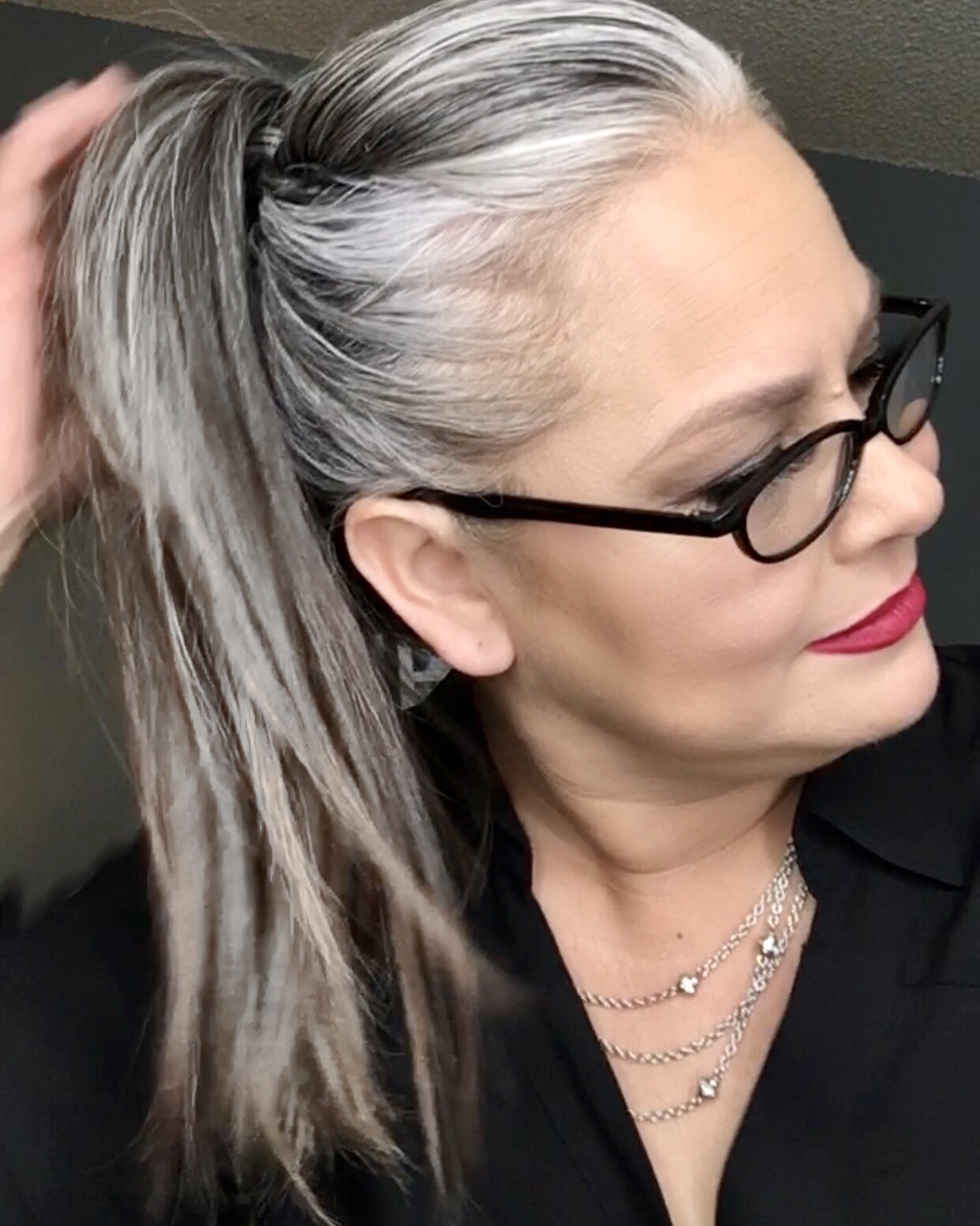 High Ponytail with a Fringe Twist