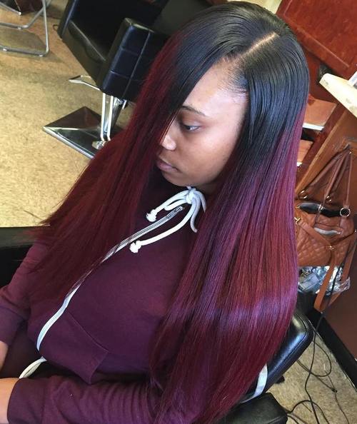 long straight burgundy-toned weave hair