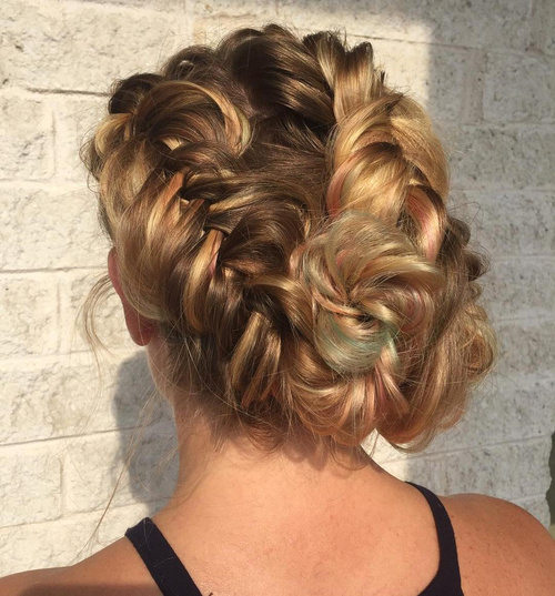 messy updo with two fishtail braids
