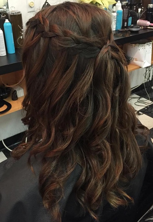curly braided half updo for layered hair