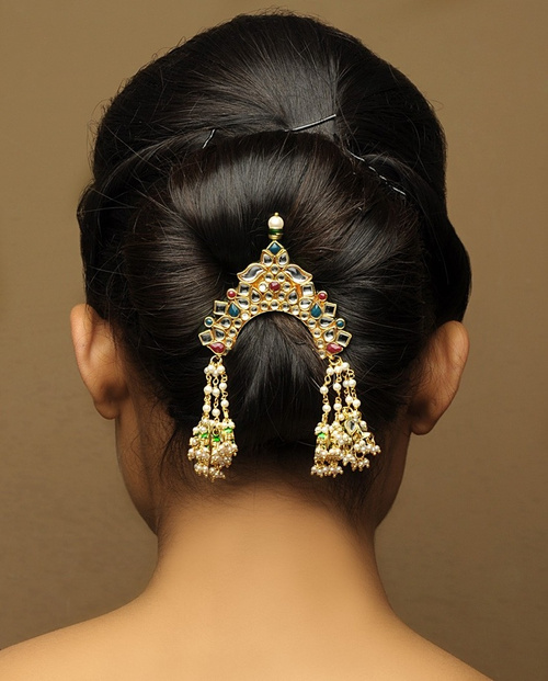 minimalistic bun updo for Indian wedding