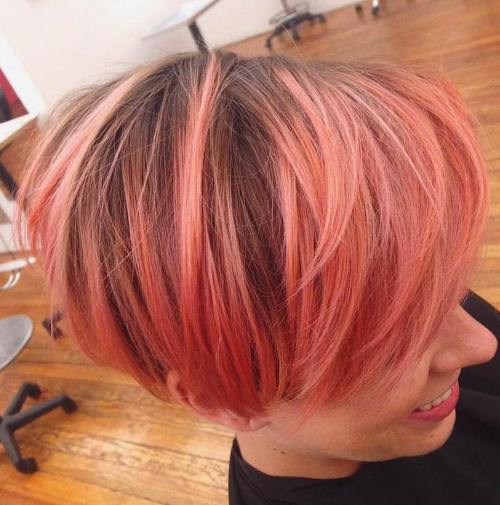 coral pink bob with brown roots