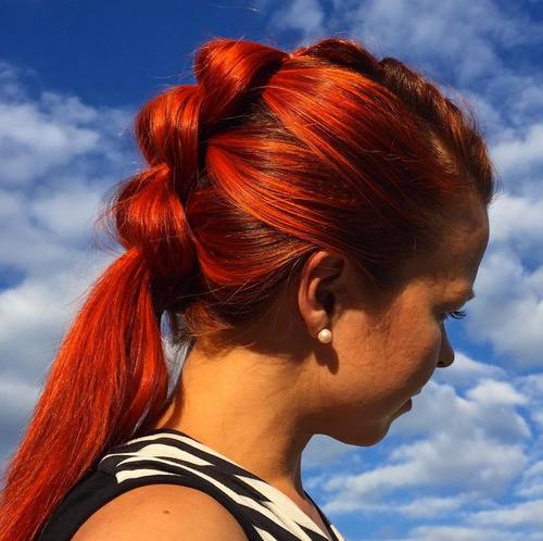 red mohawk braid with a low ponytail
