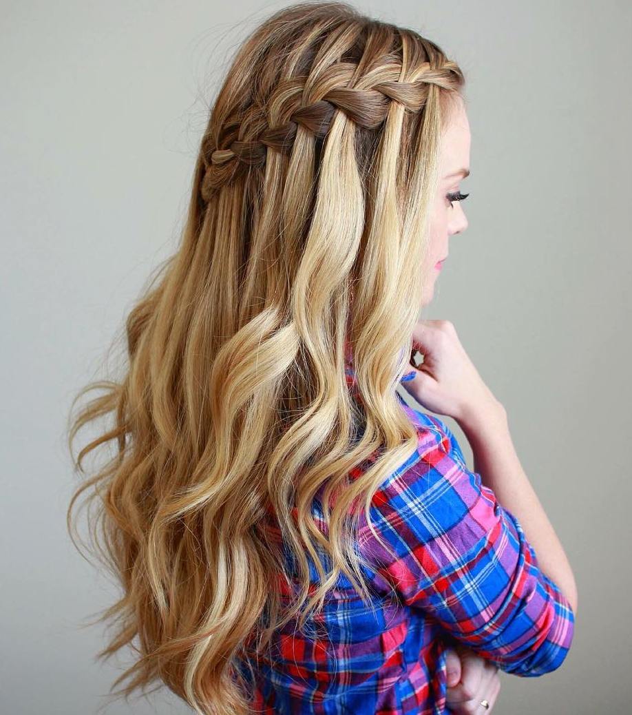 half updo with waterfall braid and curls
