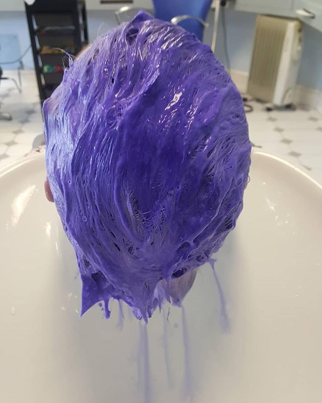 Washing Hair with Purple Shampoo