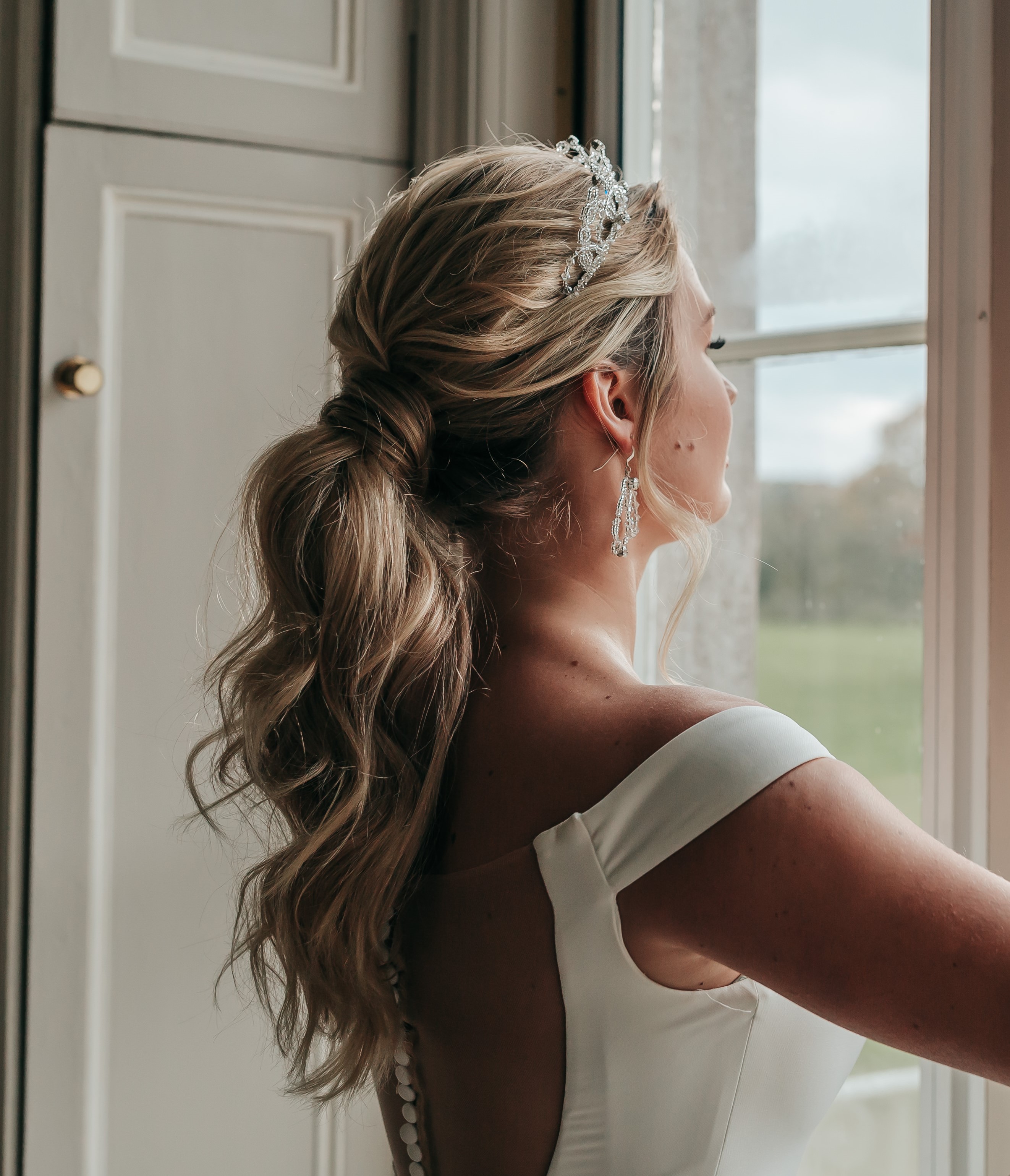 Bridal Hairstyle Ponytail with a Crown